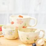 كوب سيراميكي بالالوان الأربعة بتصميم الزهرة