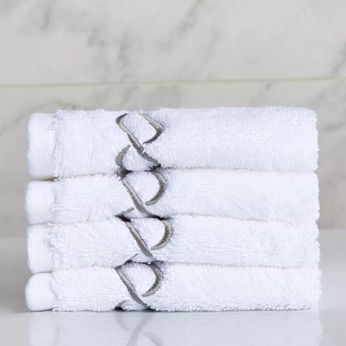 img_7097 طقم مناشف صغيرة 4 قطع - ويفز - (مصري)30x30 سم - الصورة 1