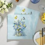 مناديل مطبوعة بالازهار والفرشات الزرقاء