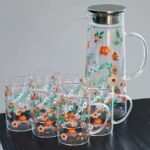 ابريق مع 6 كاسات زجاج مطبوعة